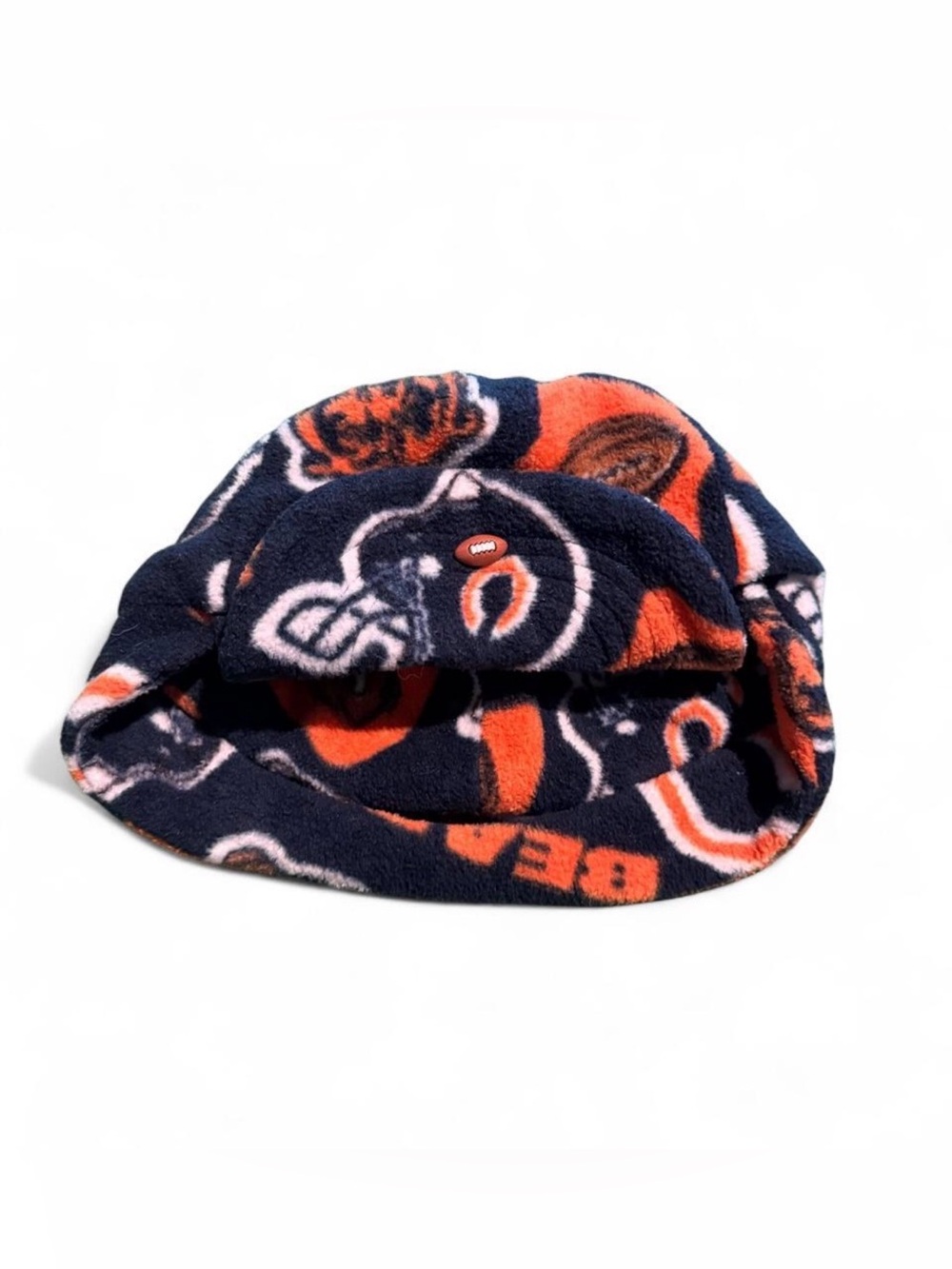 Chicago Bears fleece hat with orange and white logo pattern on navy blue